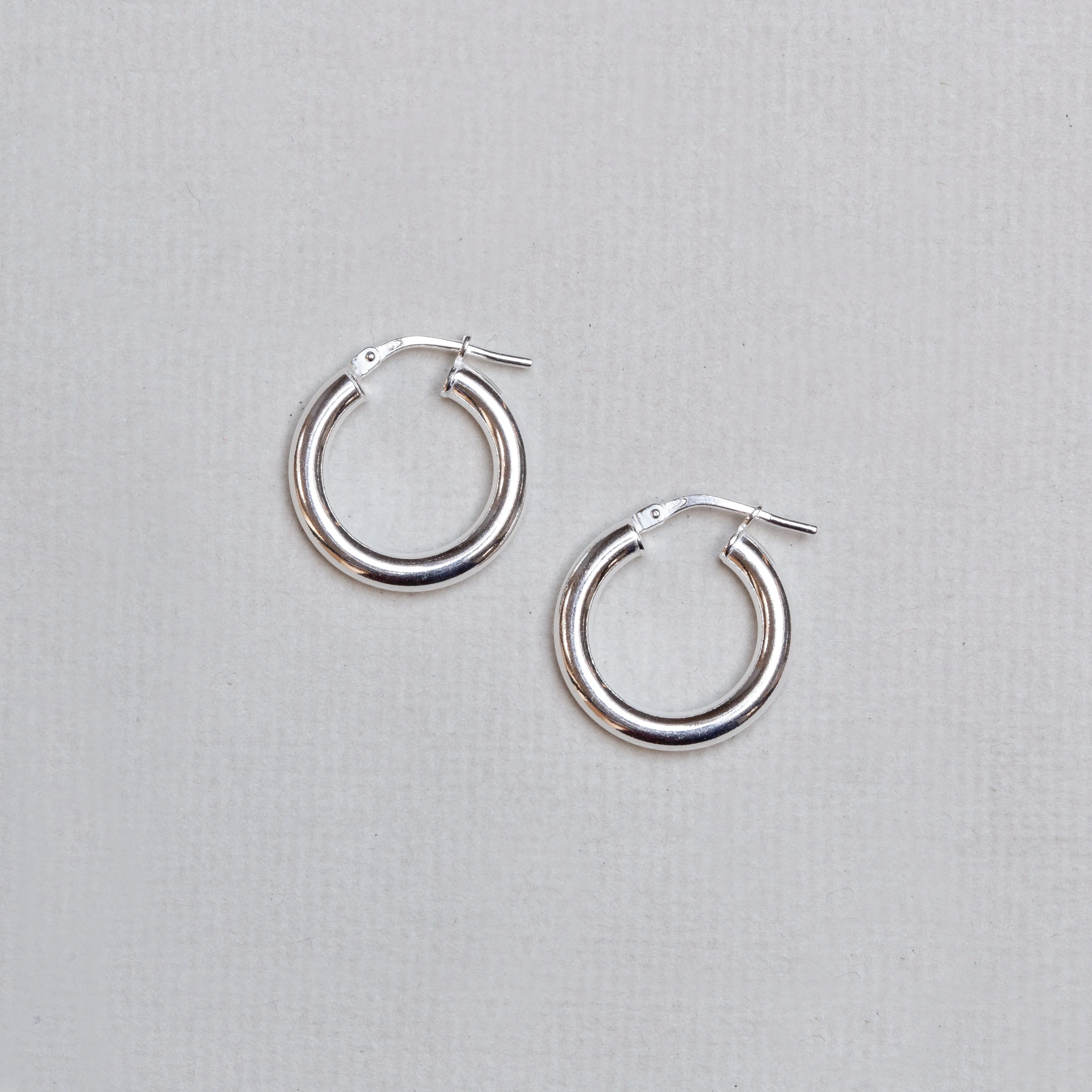 Tube Hinged Hoop Earrings in Gold & Silver